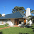 Beautiful three bedroom house, pool and tennis court stops 500 meters from Playa Mansa