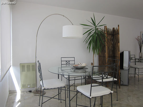 View of the west side of the living room from the entrance to the kitchen.