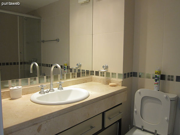 View from the suite down the hall leading to the second bedroom. To the left of the image the bathroom of the suite.