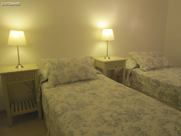 Second bedroom. Located building the building. It is equipped with two single beds.