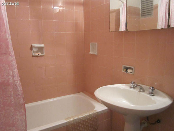 Master bath. Located to the left of the hallway leading to the bedrooms before the second bedroom. <br><br>Interior bathroom, well maintained period.