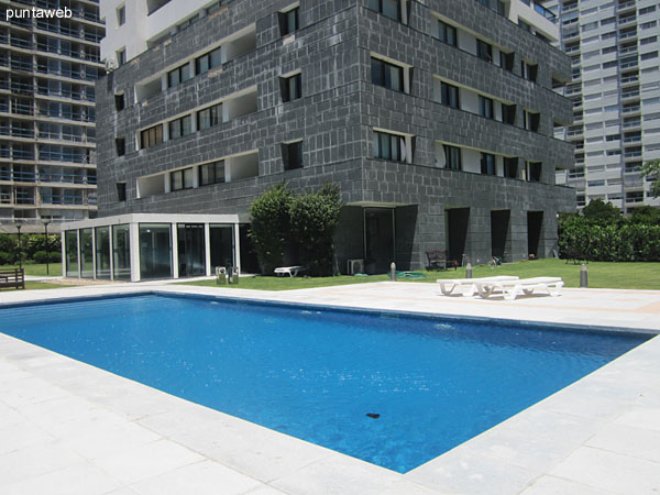Heated pool. Located on ground floor in sector amenities behind the lobby.