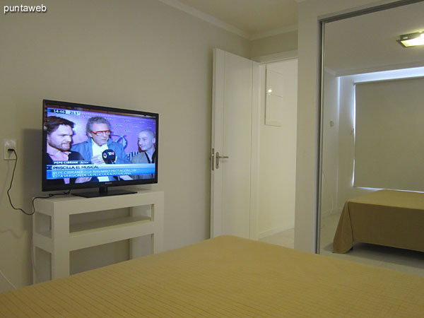 Master Bedroom. View closet with sliding mirrored walls.