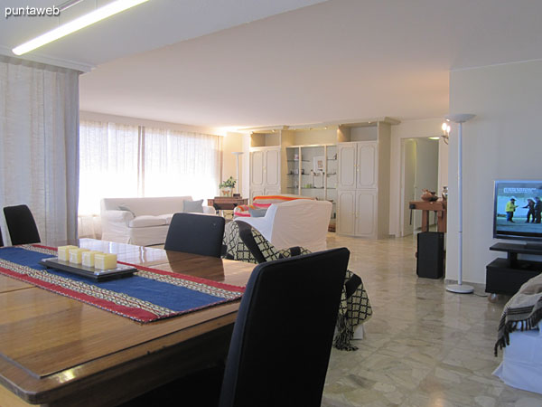 View from the dining room to the TV room environment.