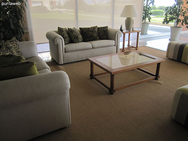 View to the front garden from the reception.<br><br>To the left of the image, outdoor pools.