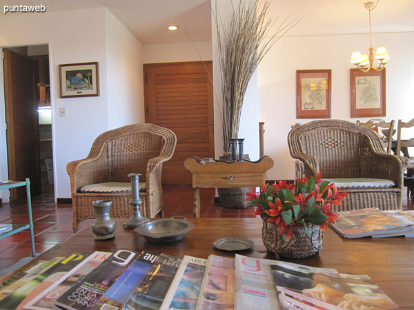 Partial view of living in the living room from the right corner to the dining room on the opposite corner on the south side.