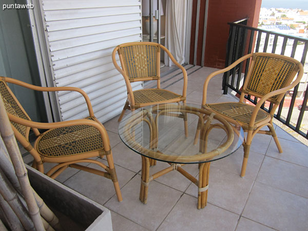 Looking west on the south end of the island Gorriti from the apartment balcony.<br><br>In the foreground set of table and chairs.