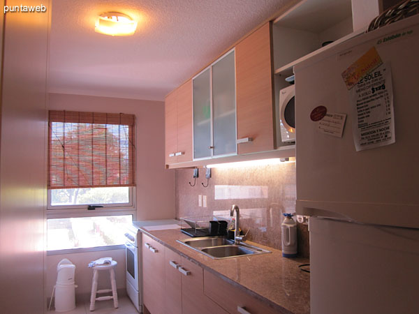 The third en suite bedroom is fitted with shower and shower curtain.