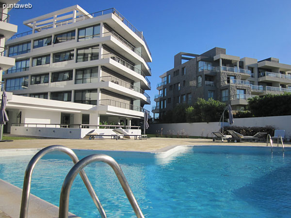 Building two blocks from the garden where the pool is located outdoors.