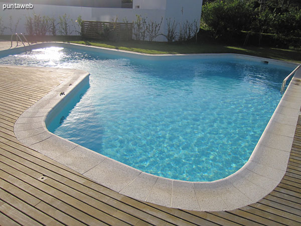 General view of the outdoor pool. Located to the back of the building gets sun all day.