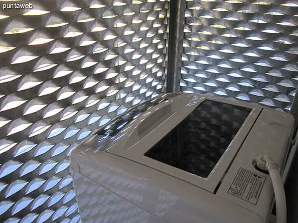 Laundry room down the hall to the second bedroom lattice consisting of singular design galvanized sheet.