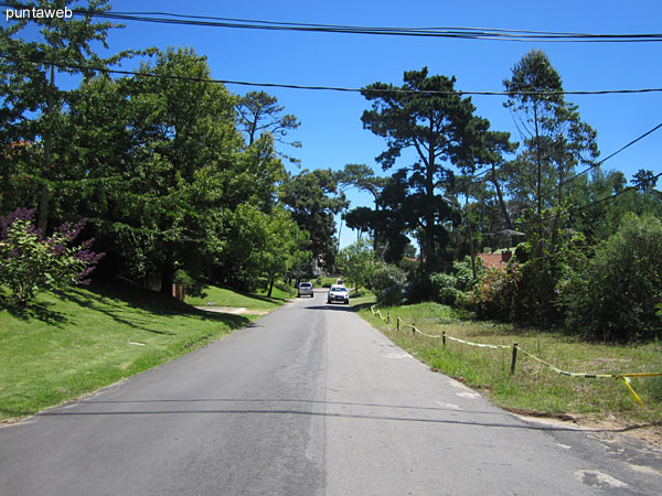 Streets around the building, wooded residential neighborhood.