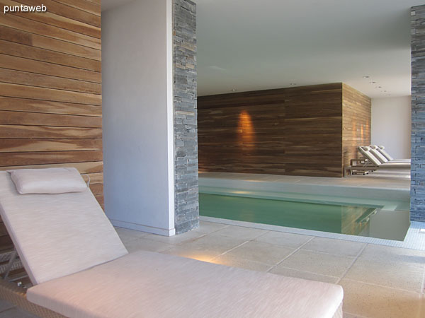 Heated pool downstairs. In this space you will also find the sauna, showers and bathrooms.