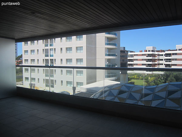 View to the balcony from the second bedroom.<br><br>Sliding double pane windows provide access.