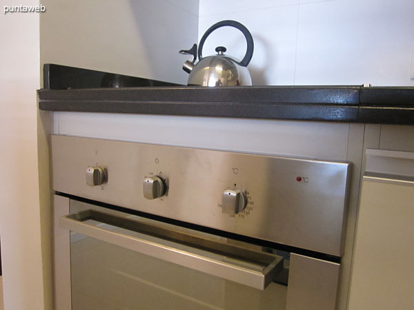 Detail of four glass–ceramic kitchen stove.