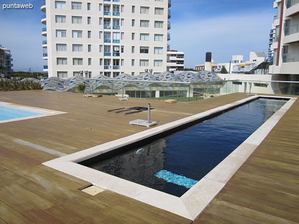 Pool for children in the garden of the building.<br><br>In this space there is also the swimming pool for adults and a pool of continuous swimming.