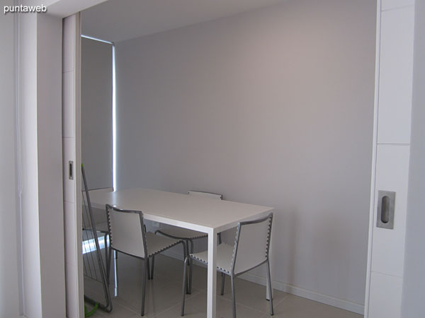 Rectangular dining table in wood with up to six people.