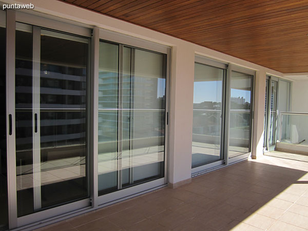 Large terrace balcony connecting all rooms of the apartment.