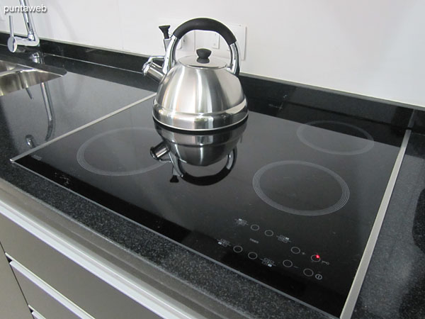 Detail of stainless steel double sink in the kitchen.