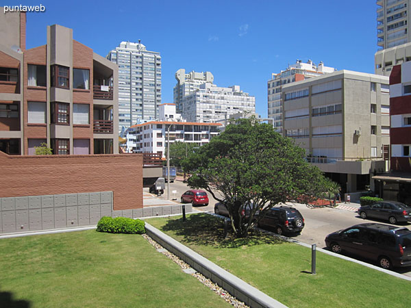 Overlooking the outdoor pool and the garden of the building on the west side.