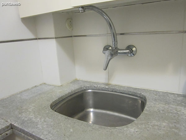 Detail of cooking gas and electric countertop and shelves.