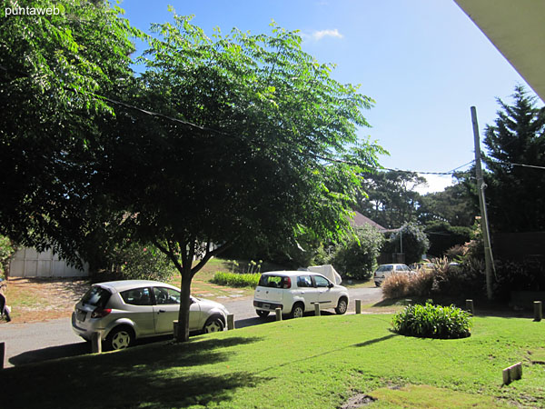 Outdoor barbecue in common use located in the backyard of the building on the north side.