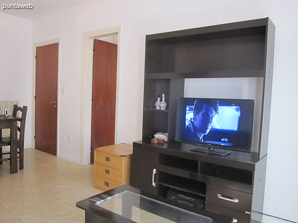 Living room environment. To the right of the image access to the second bedroom.<br><br>To the right of the image access to kitchen, bathroom and master bedroom.