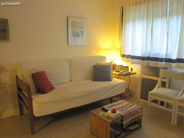 General view of the living room from the entrance to the apartment.<br><br>The window offers views to the south side.<br><br>It has ceiling fan.