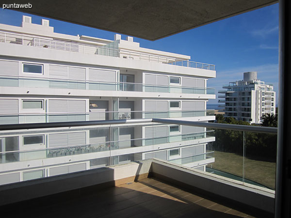 View to the front of the Brava beach from the master suite.<br><br>This window provides access to the terrace balcony.