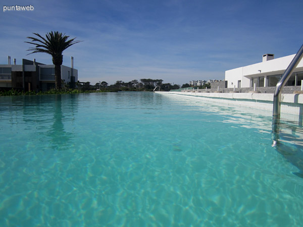 Heated pool outdoor. View to the residences.