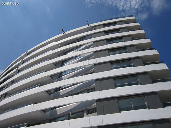 View south–level outdoor pool level to west side of building.