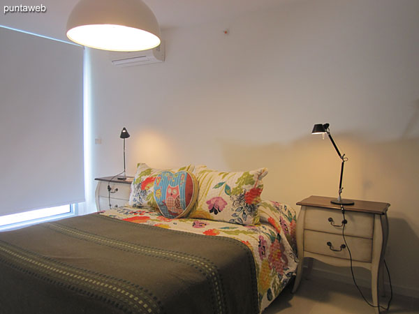 Hallway to the bedrooms. To the right of the image the suite, on the left, the second bedroom.