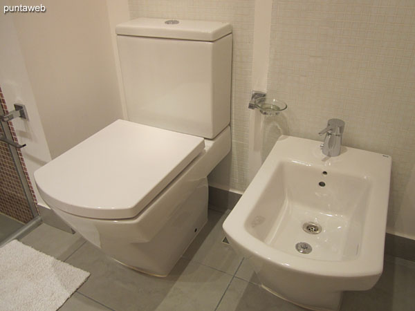 Glass enclosed shower in the bathroom of the suite.