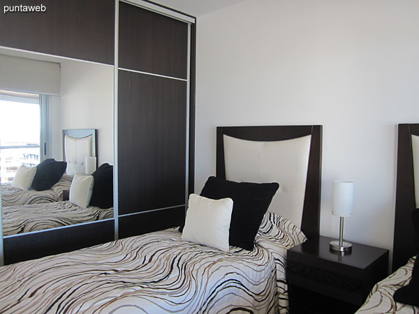 Second bedroom with access to the balcony and sea view.<br><br>Equipped with two single beds.