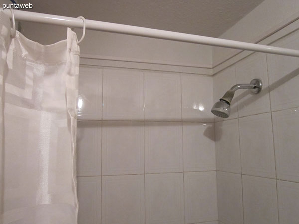 Bathroom in the master suite. Interior, equipped with shower and curtain of bath.