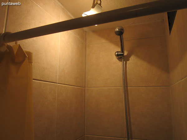 Bathroom in third bedroom suite, exterior.<br><br>Equipped with shower and bath curtain.