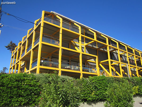 General view of the roofed and open balcony accessible from the living room and main suite of the apartment.