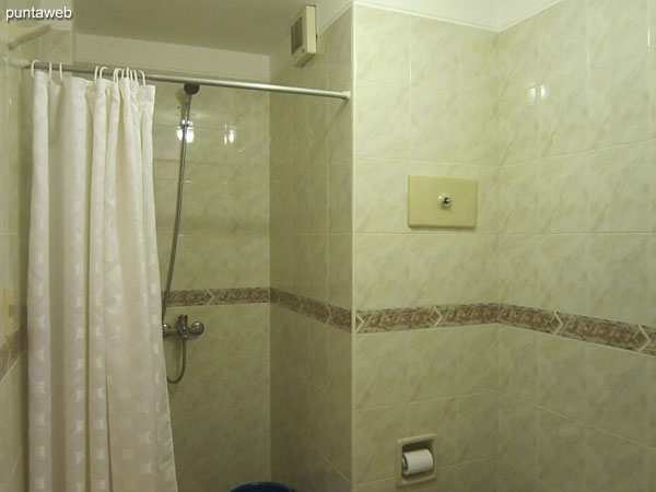 Bath. Inside. Equipped with shower and bathroom curtain.