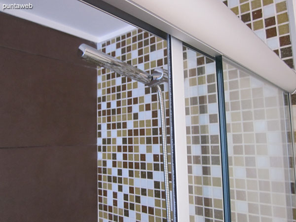 Detail of faucets and sanitary fixtures in the bathroom of the suite.