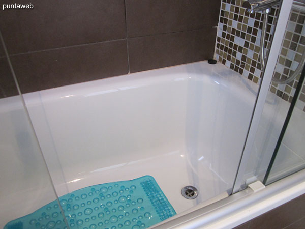 Detail of single lever faucet in the shower of the bathroom of the suite.