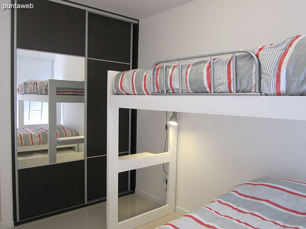 Second bedroom. Equipped with bunk bed with sea bed. Capacity for three persons.