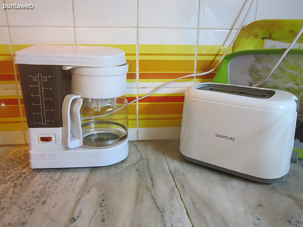 Gas cooker with four burners.