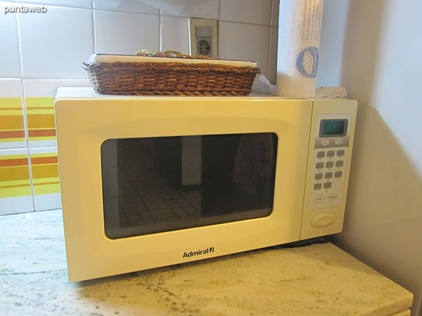 Detail of the domestic appliances: coffee maker, toaster and electric juicer.