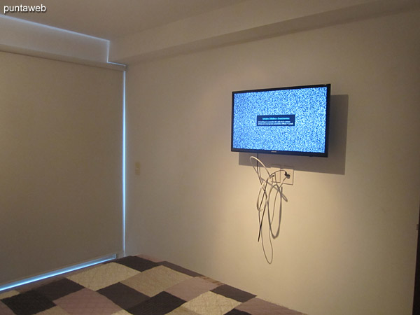 TV with cable in the bedroom.