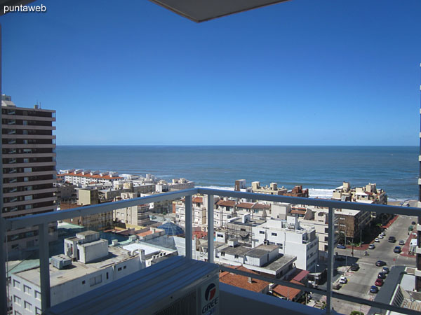 Outdoor pool located on second floor level. It has solarium space with sun loungers and umbrellas.