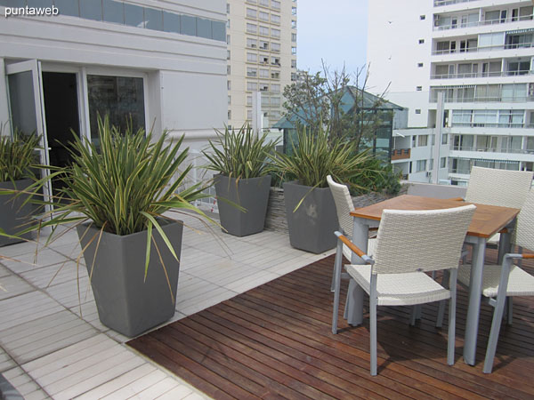 Parasols and sun loungers in the outdoor pool area located on the second floor terrace.