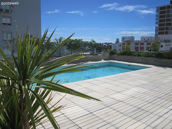 View to the terrace with outdoor pool from the living space in common use.