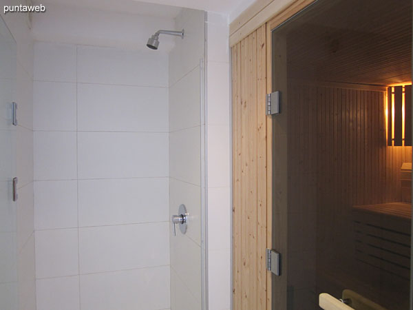 Showers next to dry sauna.