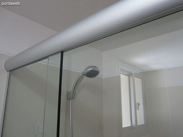 Bathroom of the suite with shower and glass screen.