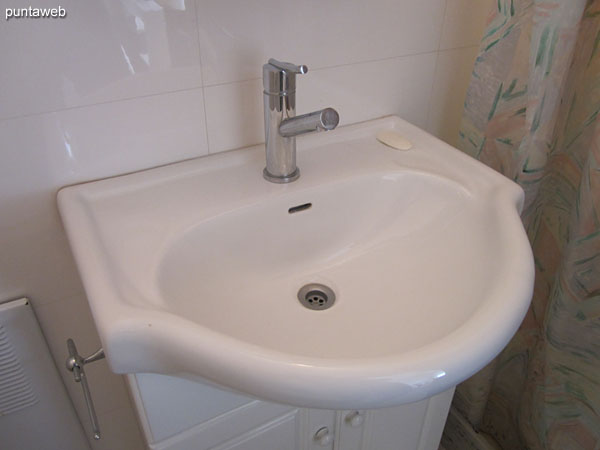 Detail of faucets and sanitary fixtures in the bathroom.